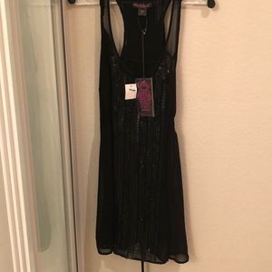 Black dress with  sequins down the front